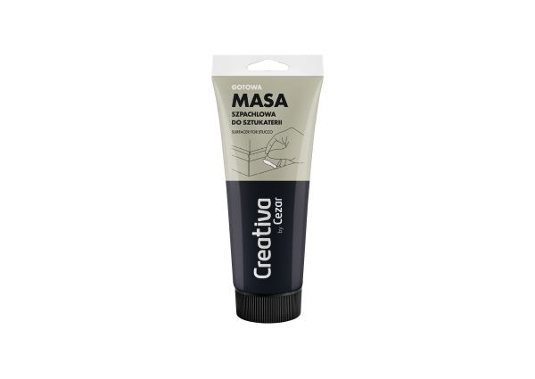megabudowlany-creativa-masa-szpachlowa-330g-sklep-budowlany - Mega Budowlany Tube of masa szpachlowa do sztukaterii (plaster patching compound) in beige and navy packaging.”,