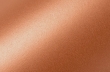 Close-up of smooth brown skin with soft lighting and subtle sheen.