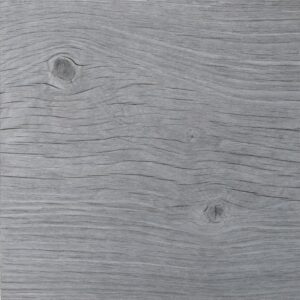 Gray wooden surface with visible grain and two knots in the plank texture, a weathered look.