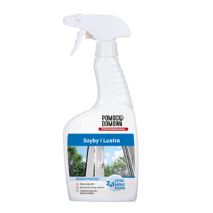 Close-up of a white cleaning spray bottle with a trigger sprayer and ribbed grip, front label partially visible with a blue banner area and outdoor scenery.
