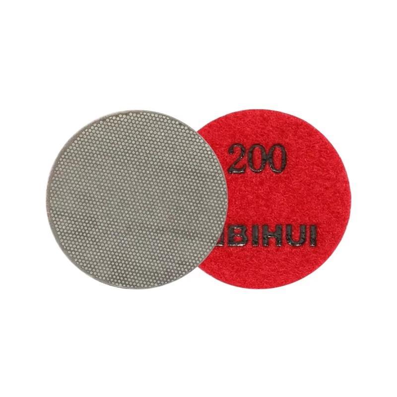 megabudowlany-bihui-mini-pad-galwanizowany-polerowanie-p200-50mm-sklep-budowlany - Mega Budowlany Two round abrasive pads: a gray textured polishing pad and a red 200-grit pad, used for sanding and polishing surfaces.