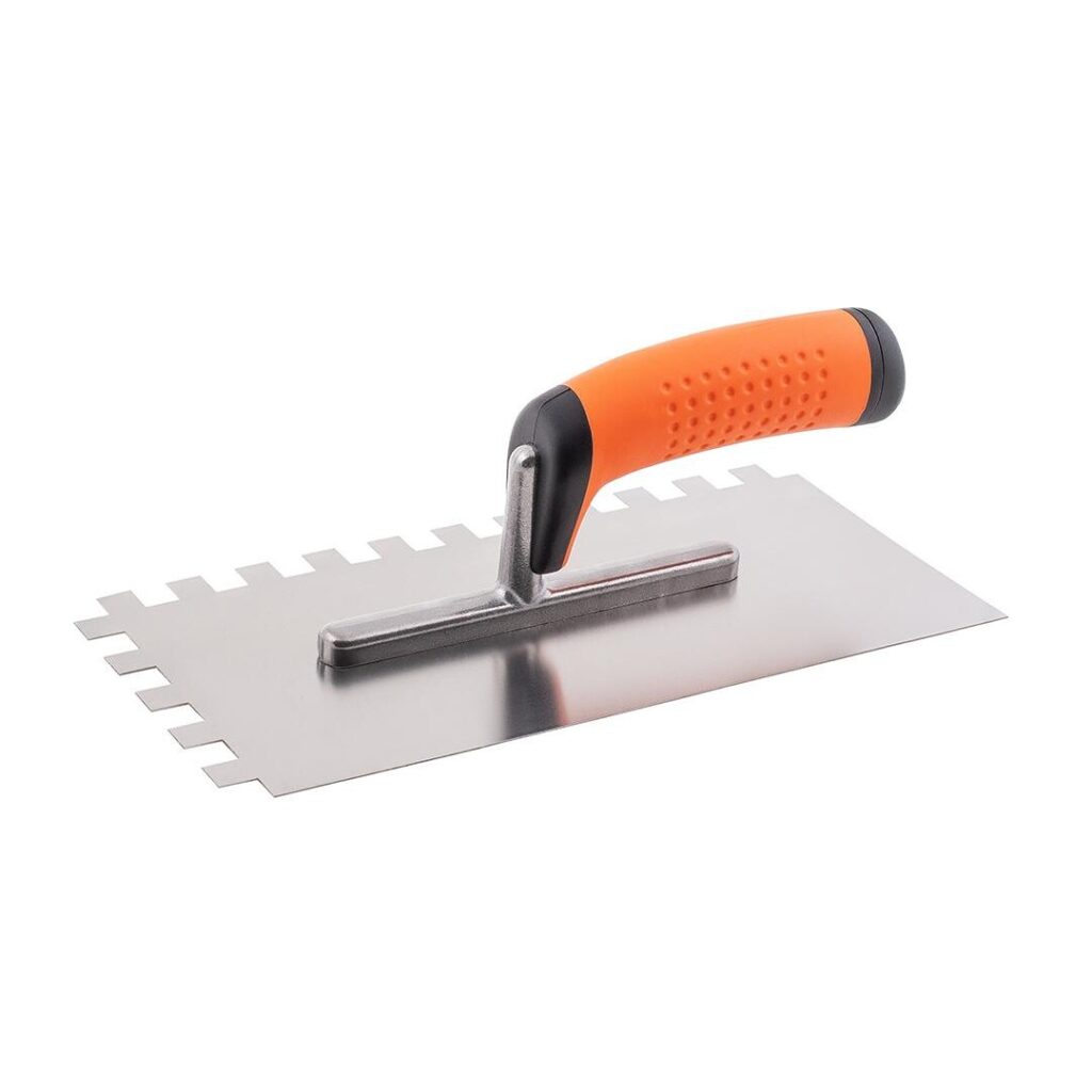 Orange-handled notched trowel for spreading tile adhesive on a substrate