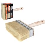 Wide natural-bristle paintbrush with wooden handle and metal ferrule, shown with its packaging at left edge (paintbrush set)