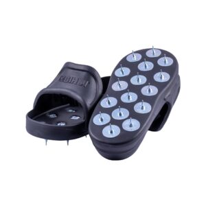 Acupressure slippers with metal spikes for foot massage, showing both soles.