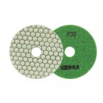 Two overlapping circular sanding discs: a green 800-grit abrasive disc and a light-colored hexagonal honeycomb backing disc.
