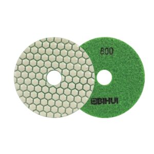 Two overlapping circular sanding discs: a green 800-grit abrasive disc and a light-colored hexagonal honeycomb backing disc.