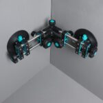 Adjustable corner clamp securing two panels at a 90-degree angle in a workshop setup with teal and black components