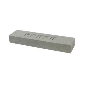 Grey rectangular abrasive sharpening/sanding stone with a rough textured surface and engraved markings on top, shown at an angle