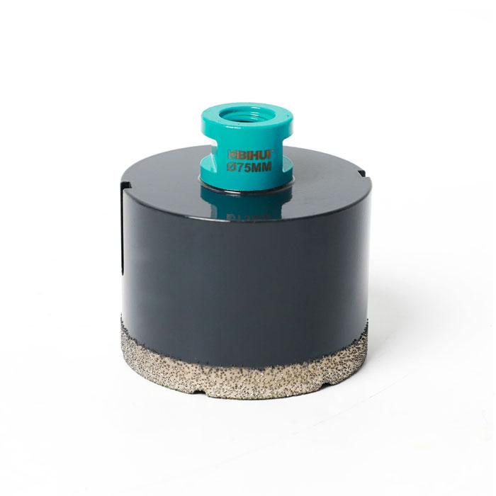 megabudowlany-bihui-otwornica-diamentowa-m14-75mm-sklep-budowlany - Mega Budowlany Turquoise arbor on top of a dark cylindrical core drill bit, Ø75mm, with a textured bottom edge indicating diamond segments on a white background under bright light.