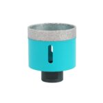 Turquoise cylindrical diamond-grit hole saw attachment with a silver abrasive rim and a dark shank at the bottom.