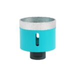 Turquoise cylindrical diffuser or small appliance with a black base and a vertical viewing window, topped with a textured silver rim and condensation beads on the surface.