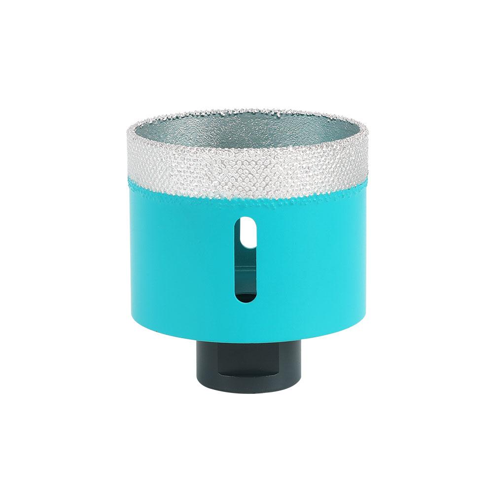 megabudowlany-bihui-otwornica-diamentowa-turbo-m14-68mm-sklep-budowlany - Mega Budowlany Turquoise cylindrical diffuser or small appliance with a black base and a vertical viewing window, topped with a textured silver rim and condensation beads on the surface.